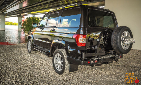 Бампер РИФ силовой задний УАЗ Патриот 2015+ с квадратом под фаркоп, фонарями, 2-мя калитками, подсветкой номера, стандарт